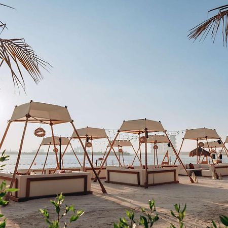 Waldorf Astoria Dubai Palm Jumeirah Esterno foto Beach at the resort