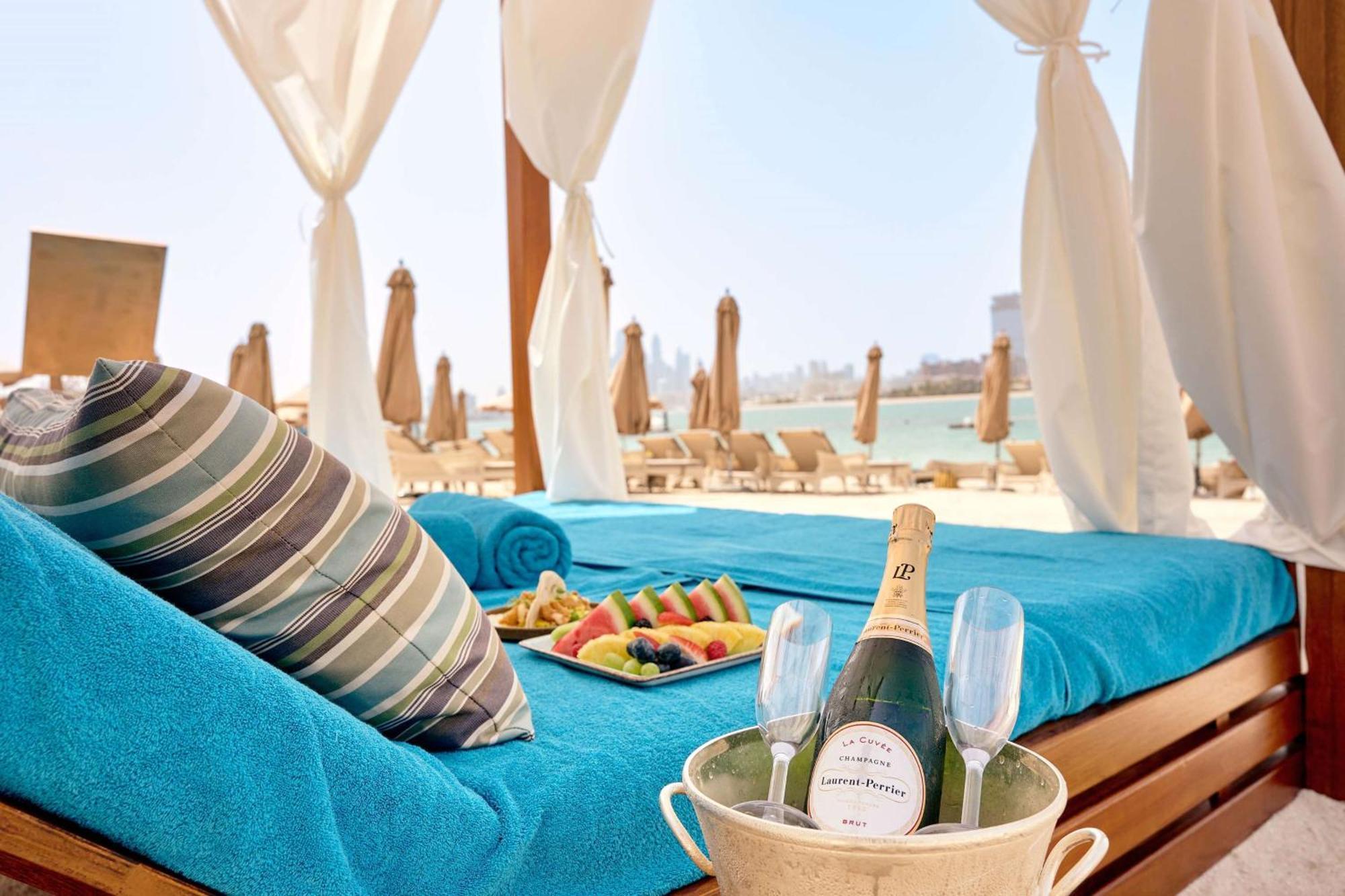 Waldorf Astoria Dubai Palm Jumeirah Esterno foto Beach at Jumeirah Beach Hotel